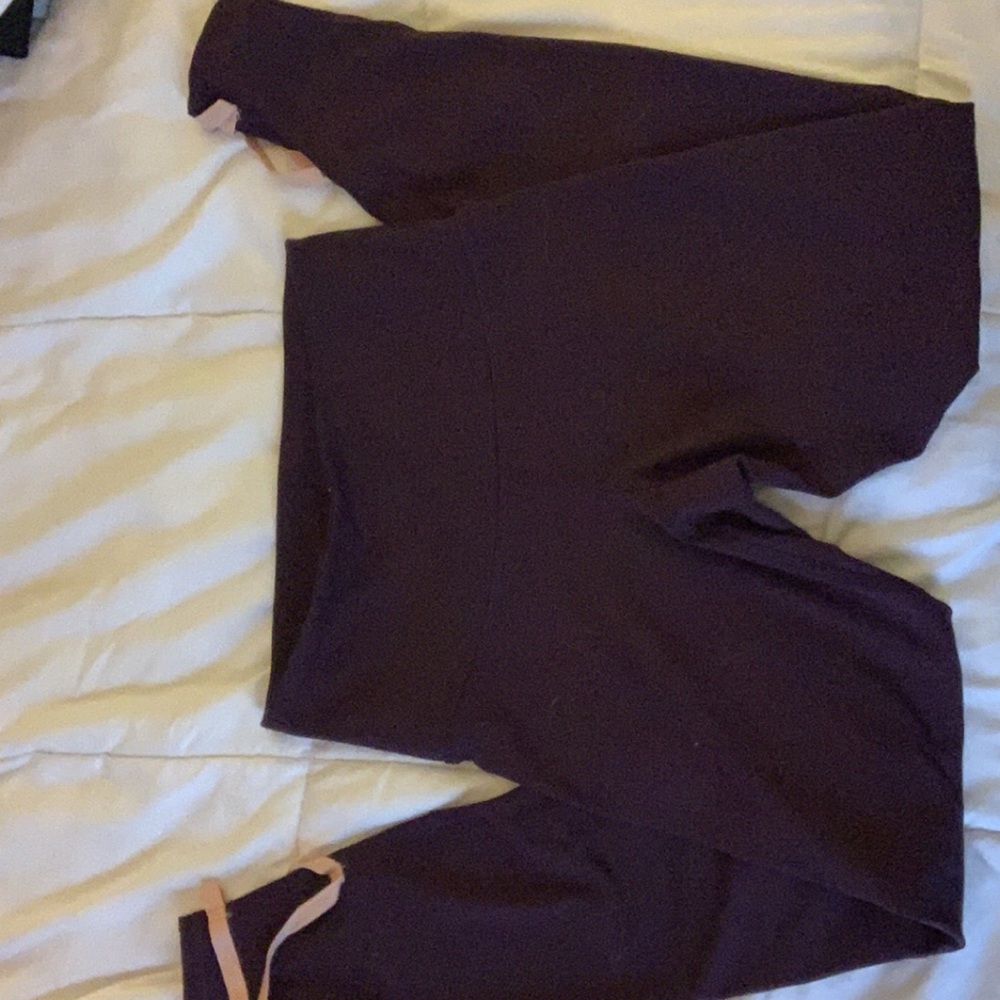 dark purple leggings with elastic at end